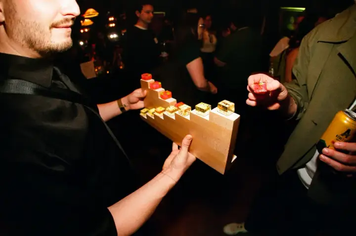 Colorful jello shots being served at the party